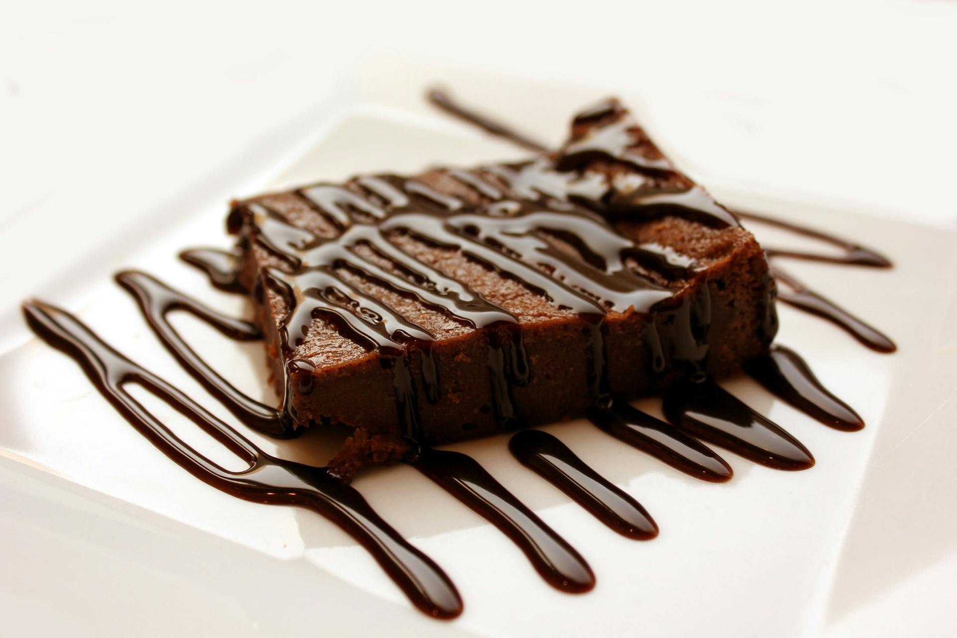 Chocolate with milted chocolate on white ceramic plate
