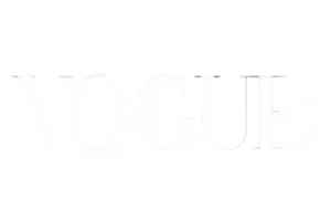 VOGUE logo in white serif font on a black background.