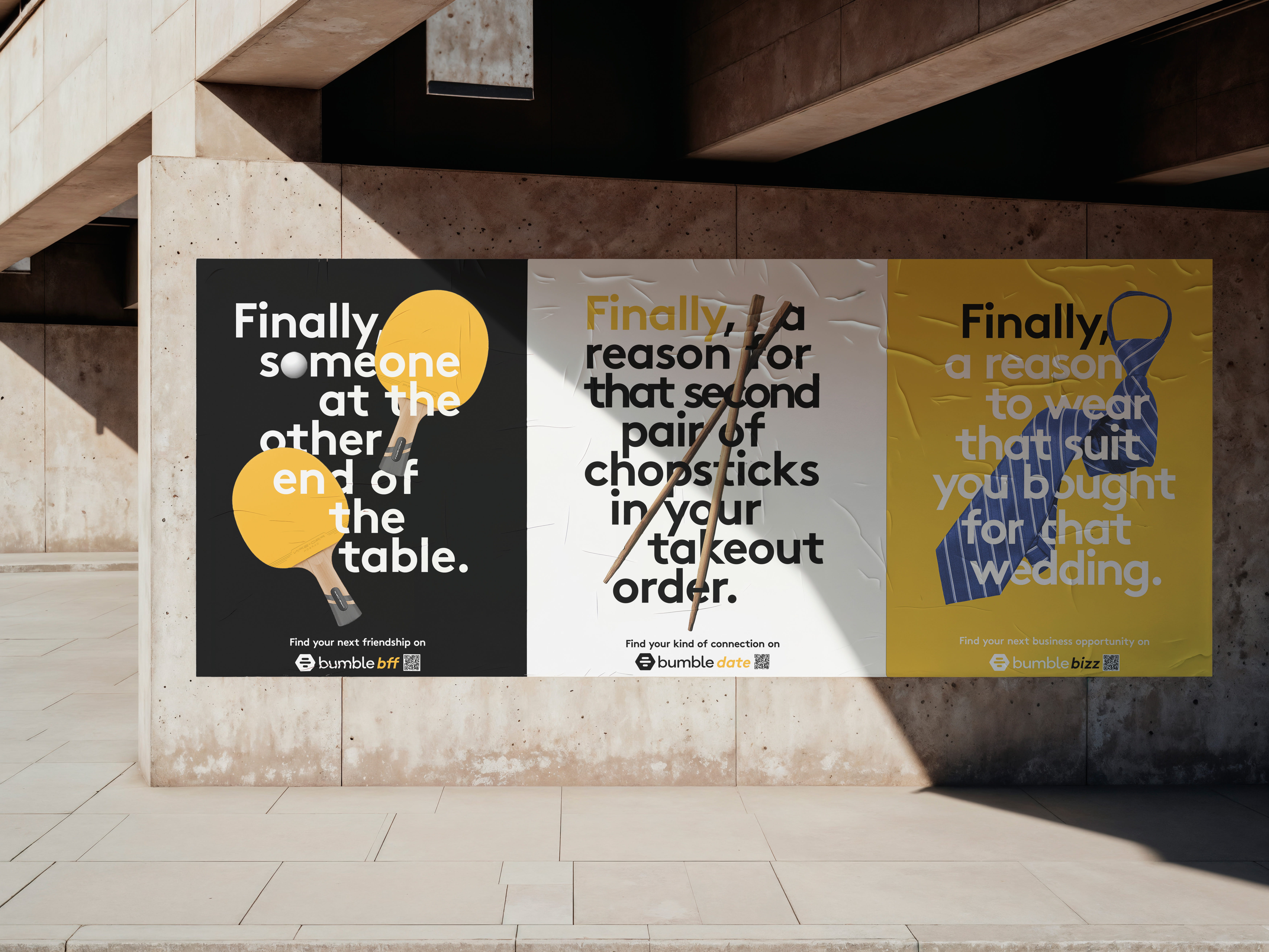 Bumble BFF, Bumble Date, and Bumble Bizz advertising posters on a modern urban concrete wall with bold graphic design and lifestyle messaging.