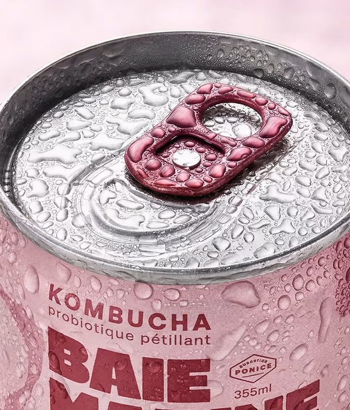 image generated by adobe firefly - Close-up of a cold pink kombucha can top with water droplets and a purple pull tab.