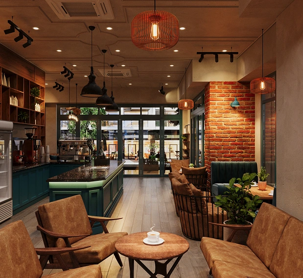 Cozy café interior with brown chairs, green island counter, brick wall, and warm pendant lighting.
