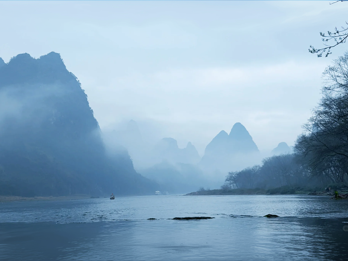 Misty spring scenery along the Li River in Guilin