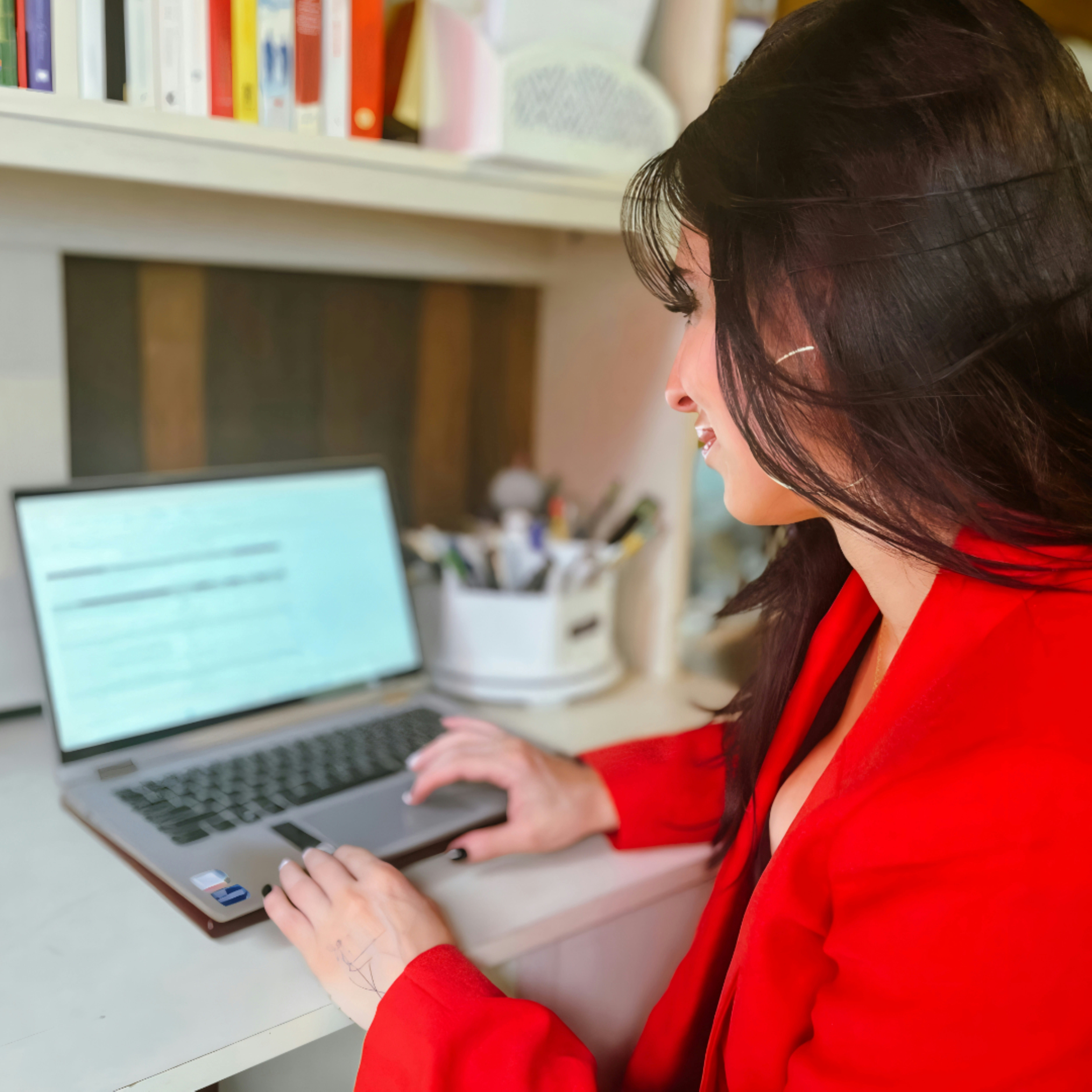 Candidate researching interview questions on a laptop