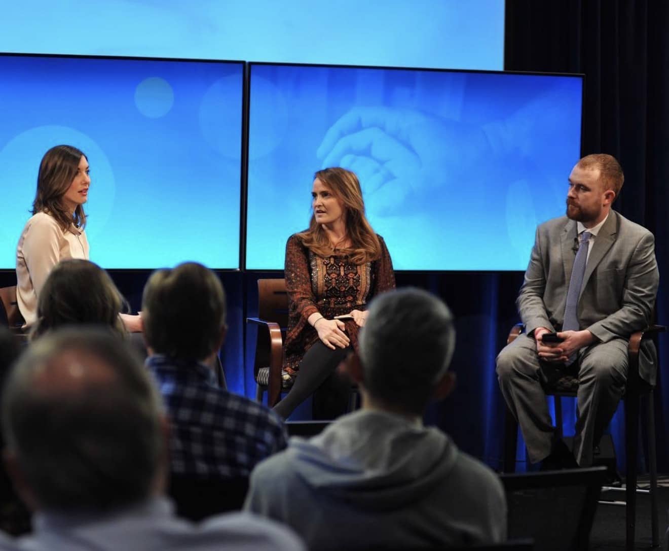 Brynne Speaking on Stage - Photo