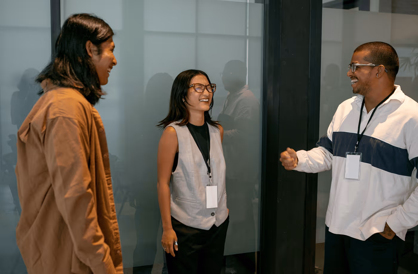 Three People Having a Conversation - Photo