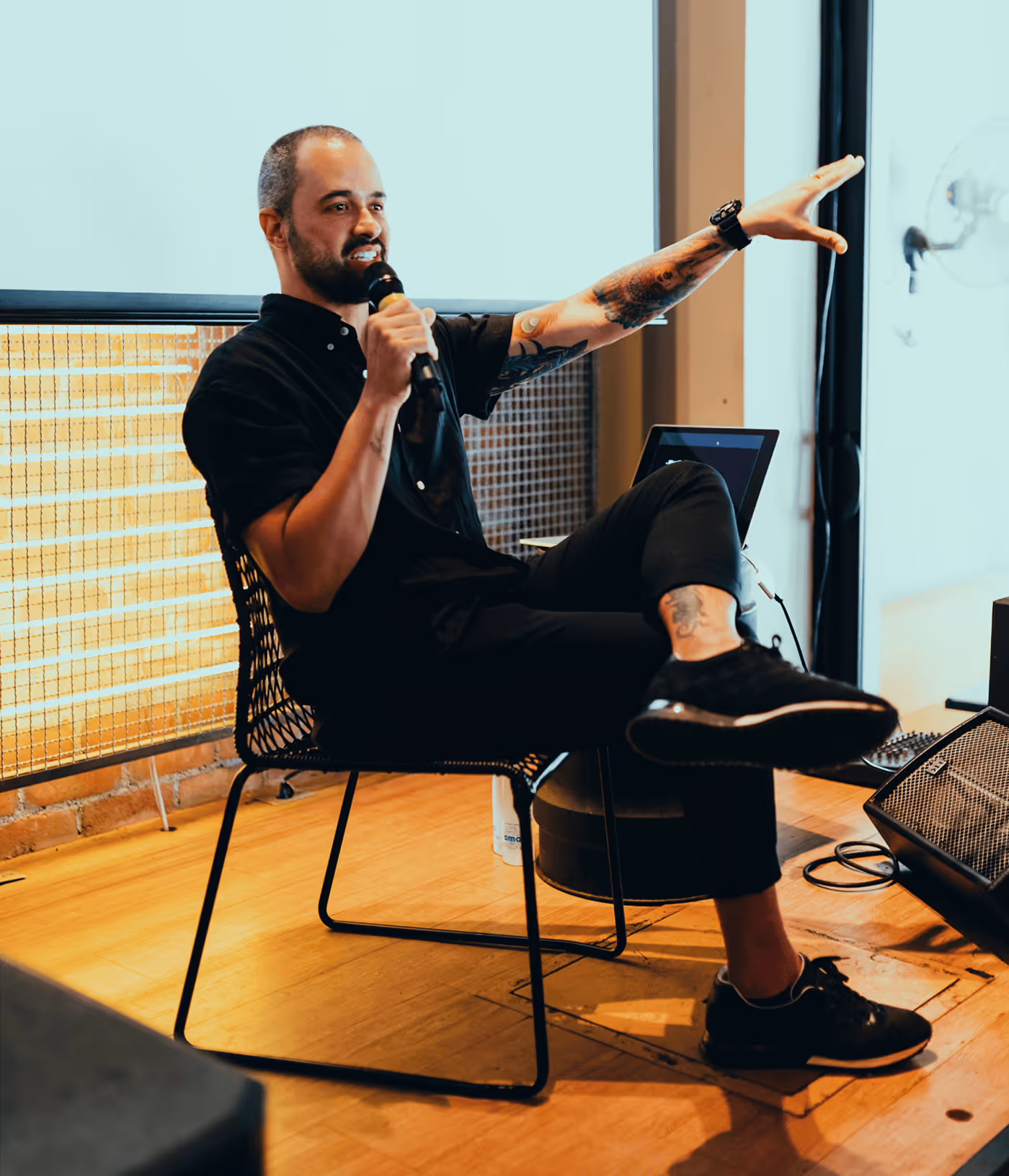 A Man Doing a Presentation on a Stage - Photo