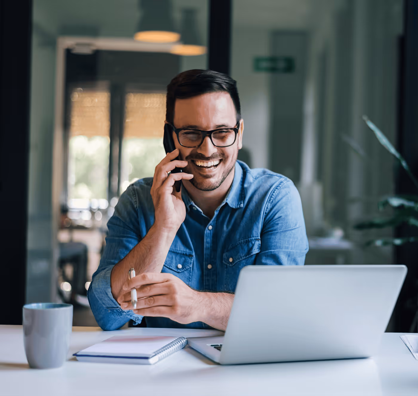 A Smiling Man having a Phone Call - Photo