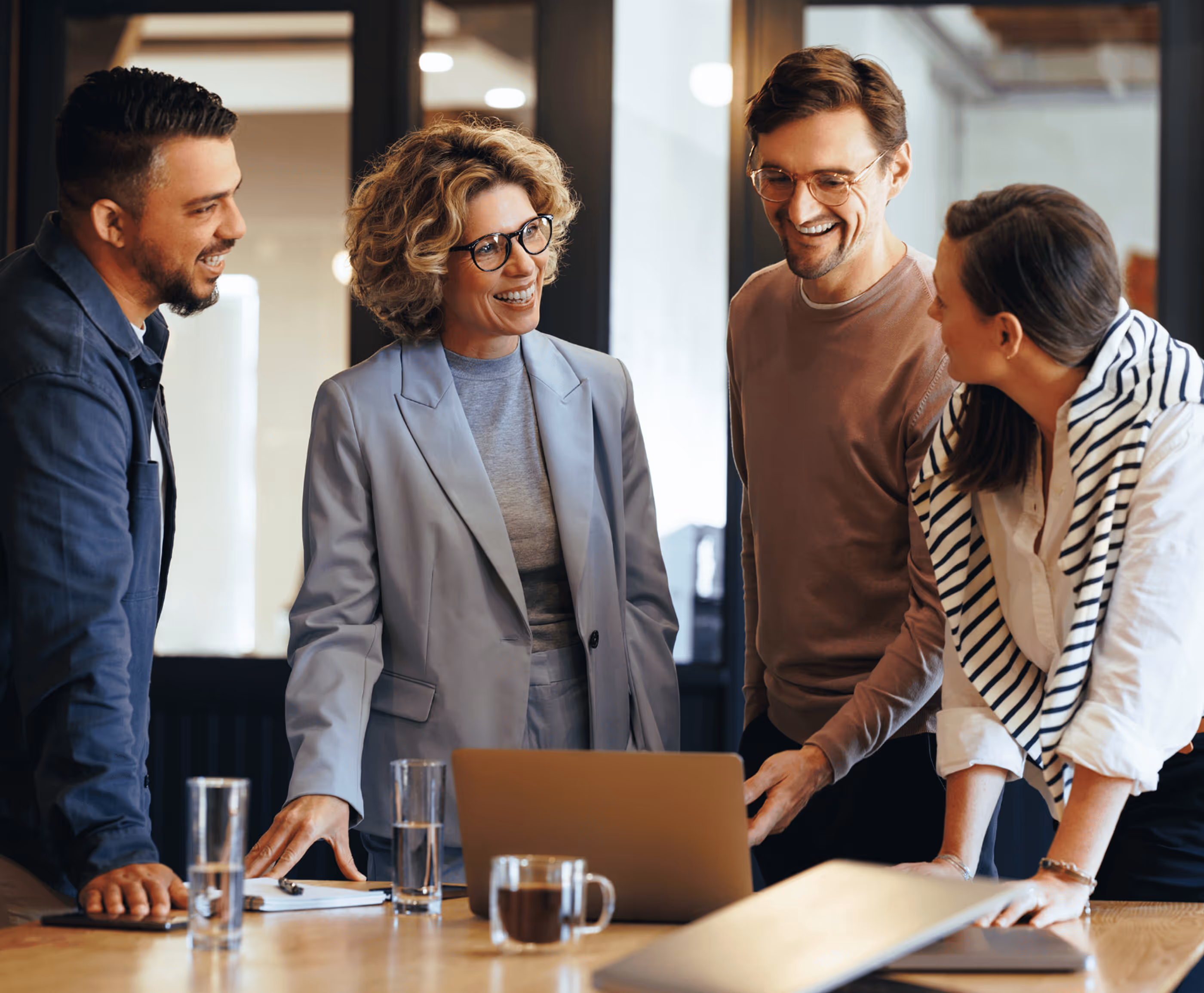 A Team Having a Meeting With Smiling Faces - Photo