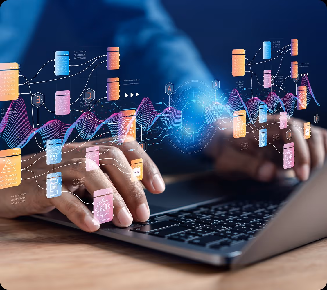 Person typing on laptop with floating colorful data management and AI icons and graphs overlay.