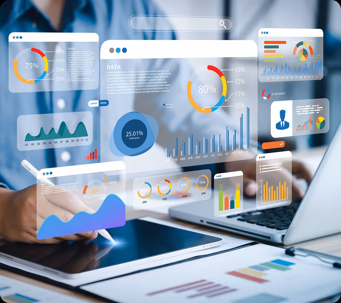 Person using a stylus on tablet with floating charts, graphs, and data analytics overlays beside laptop.