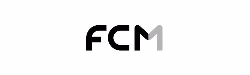 Text logo showing letters F, C, and M with M in a lighter shade.