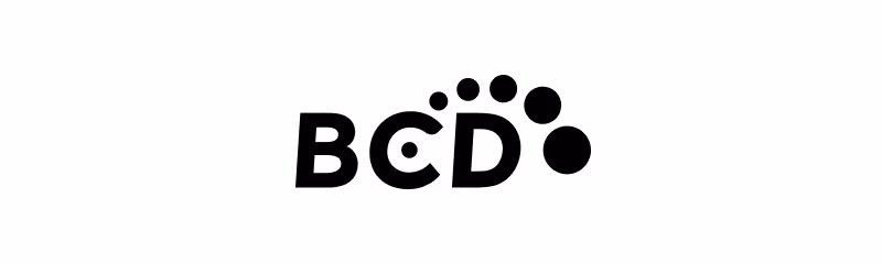 Text 'BCD' with black dots increasing in size forming an arc above the letters.