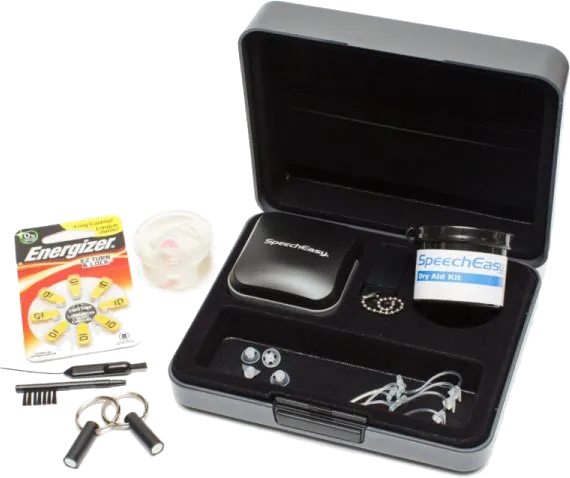 Open SpeechEasy hearing aid kit with dry aid kit, batteries, cleaning tools, and case.