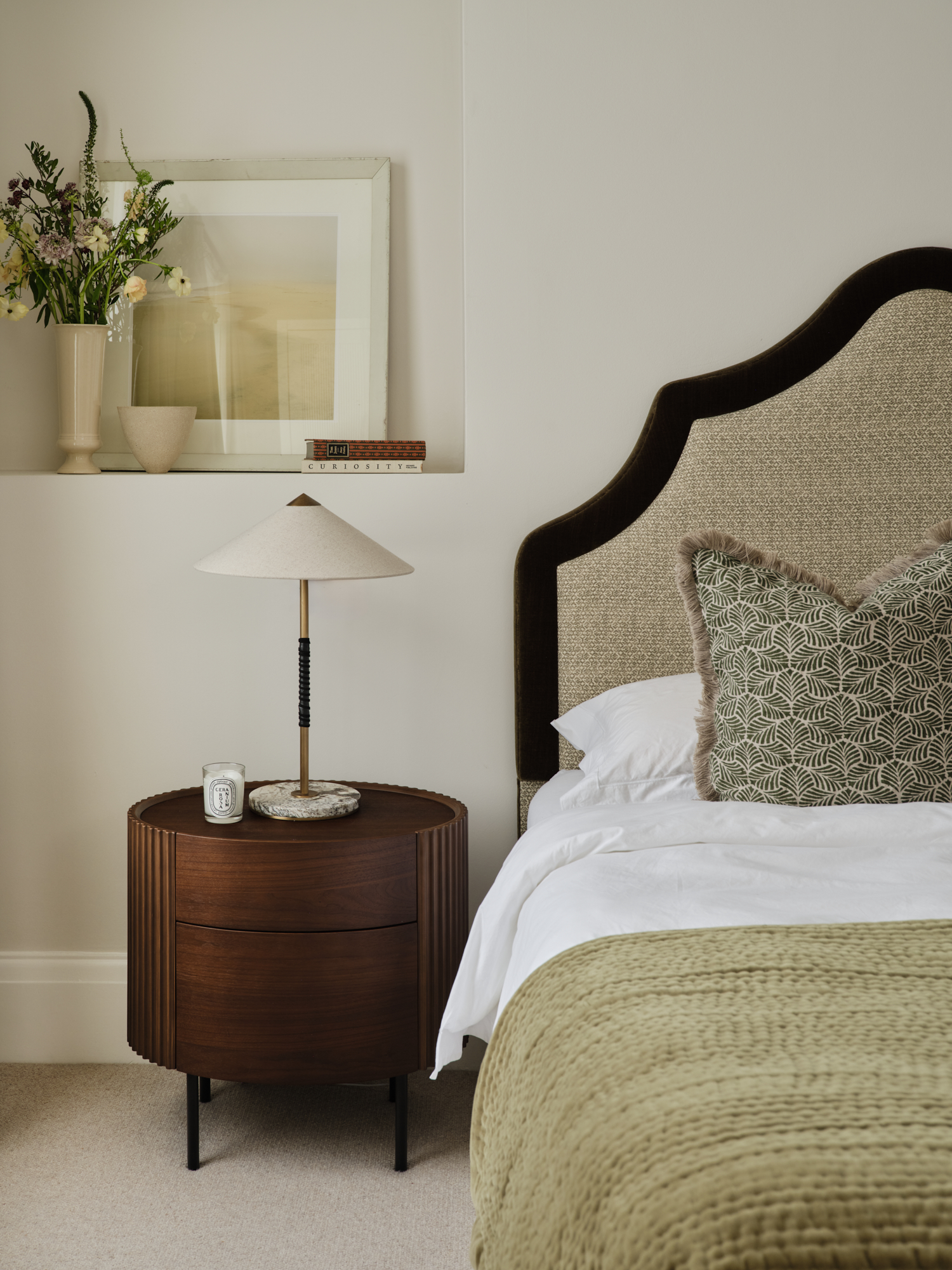 Bedroom with dark headboard