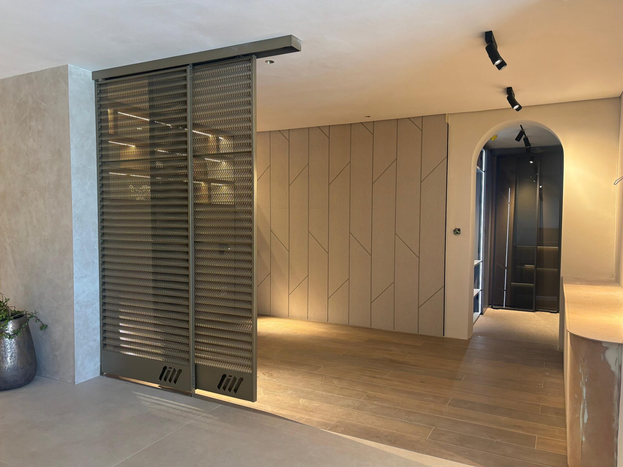Tilt laser-cut sliding screen room divider in the new collaborative showroom at Wembley Square, Cape Town