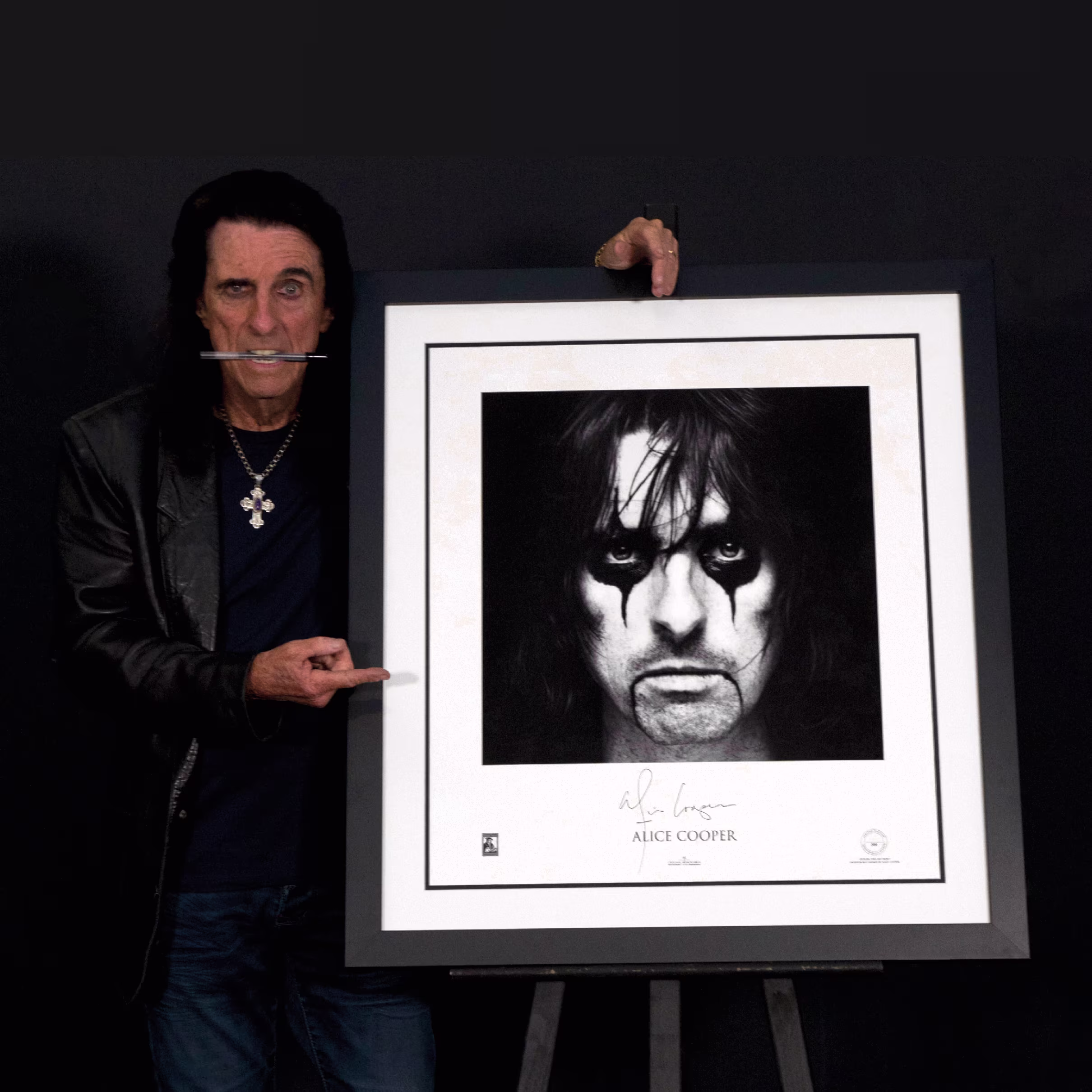 Alice Cooper with his signed fine art limited edition portrait print