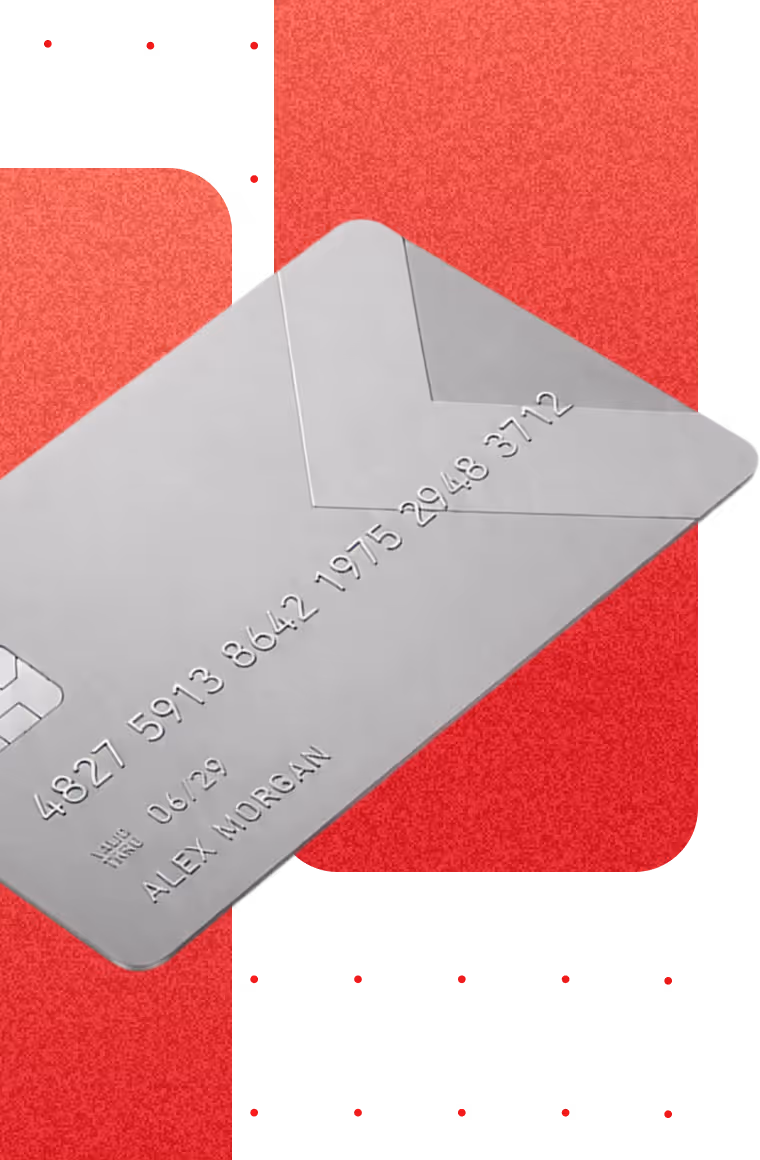 Silver credit card with chip and embossed numbers overred abstract background.