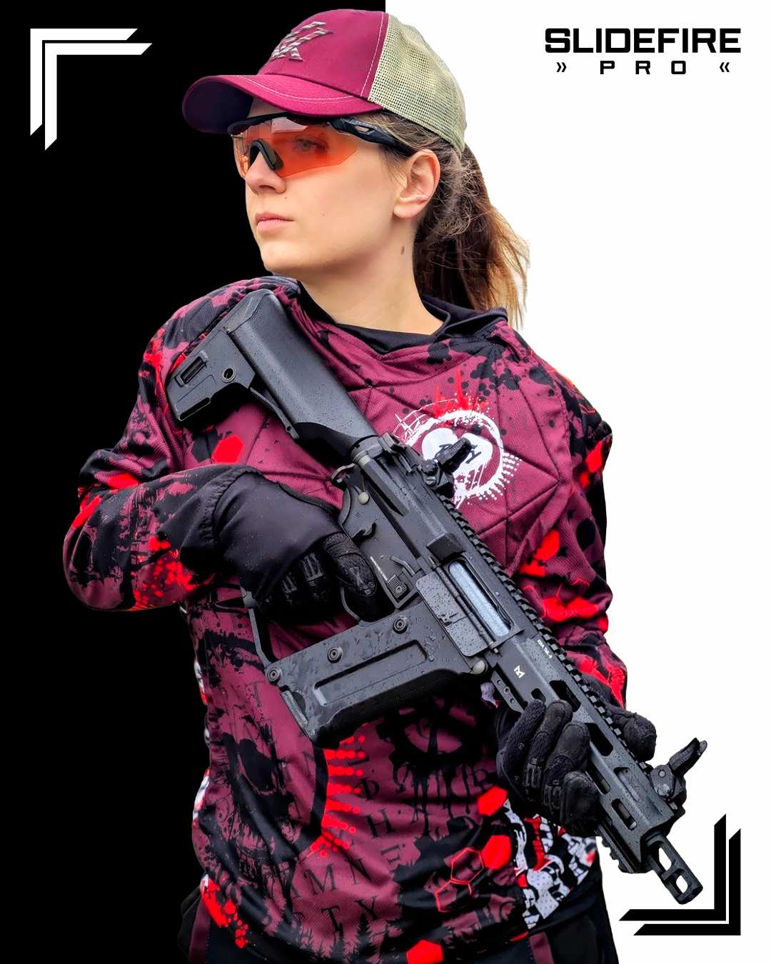 Competitive female speedsoft player wearing custom SlideFirePro jersey and tactical protective gear.