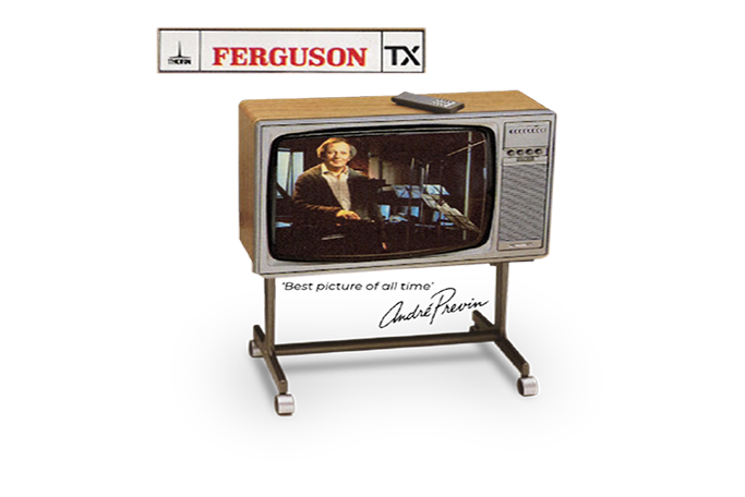 Vintage Ferguson TX television with remote and man’s portrait on the screen, on a wheeled stand.