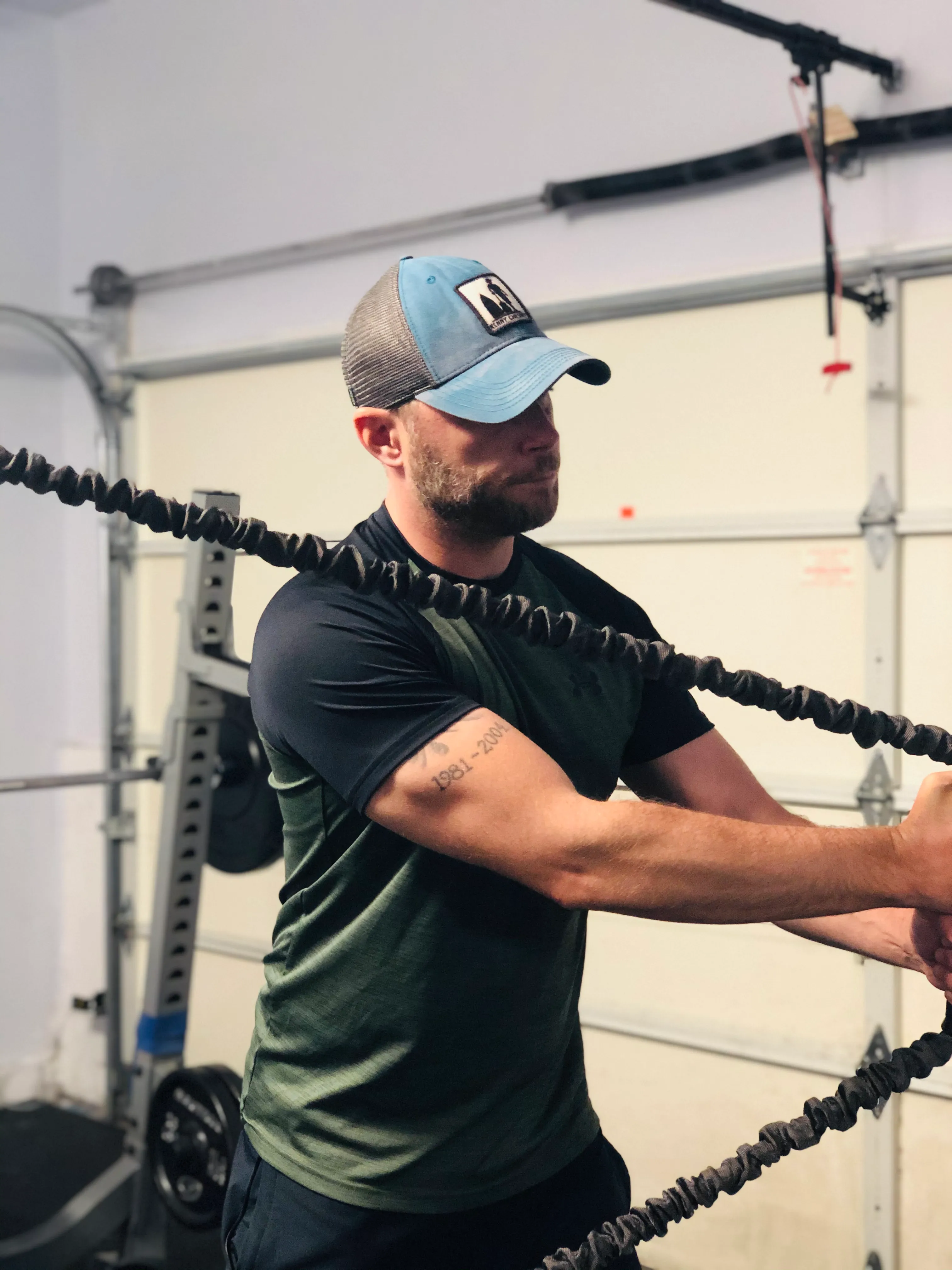 Corey Galusha demonstrating a resistance band exercise