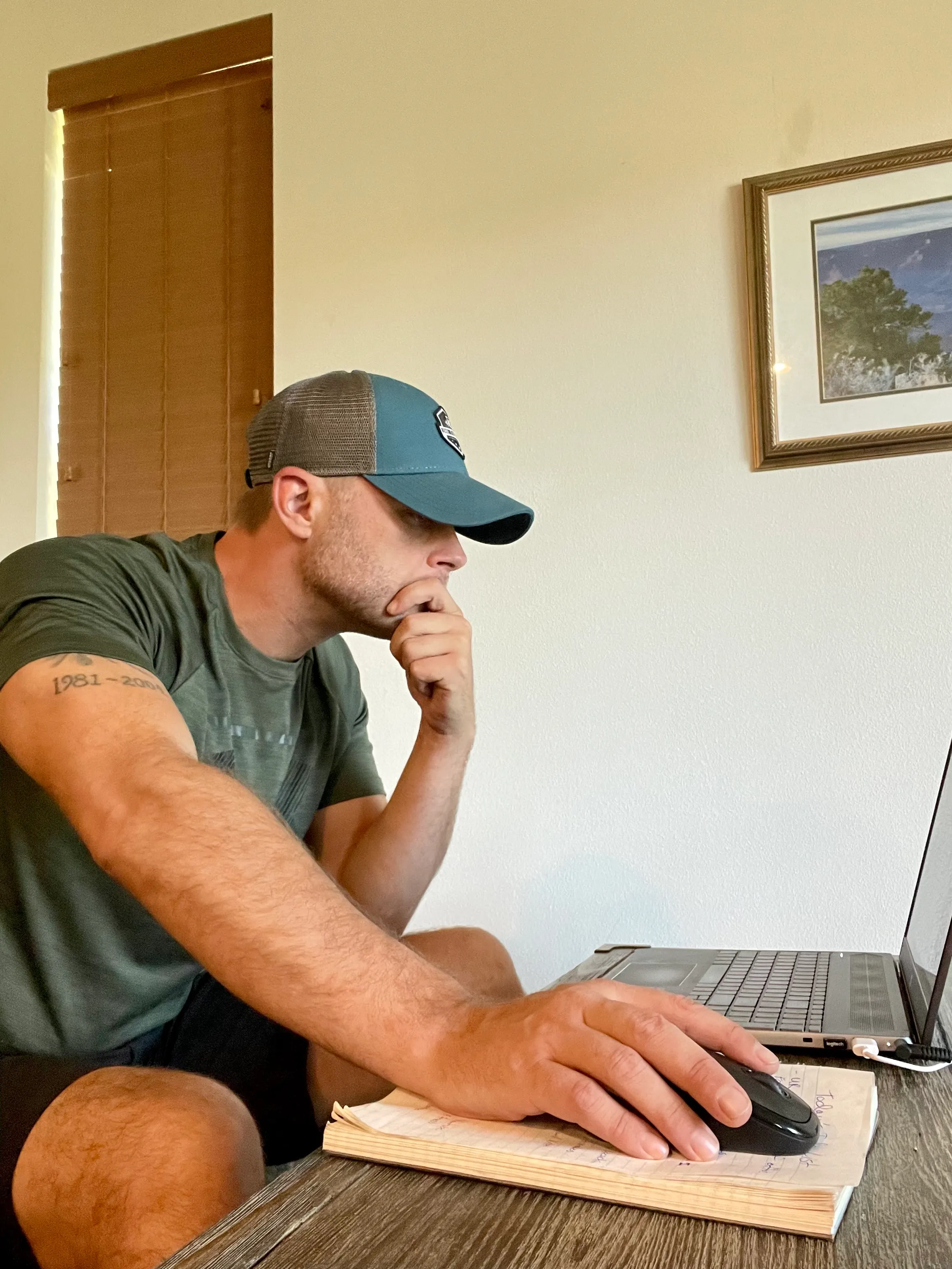 Corey Galusha coaching an online client from his laptop