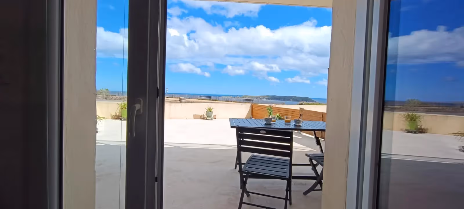 Terrasse avec vue mer d'un gîte Au Point de Vue à Perros-Guirec