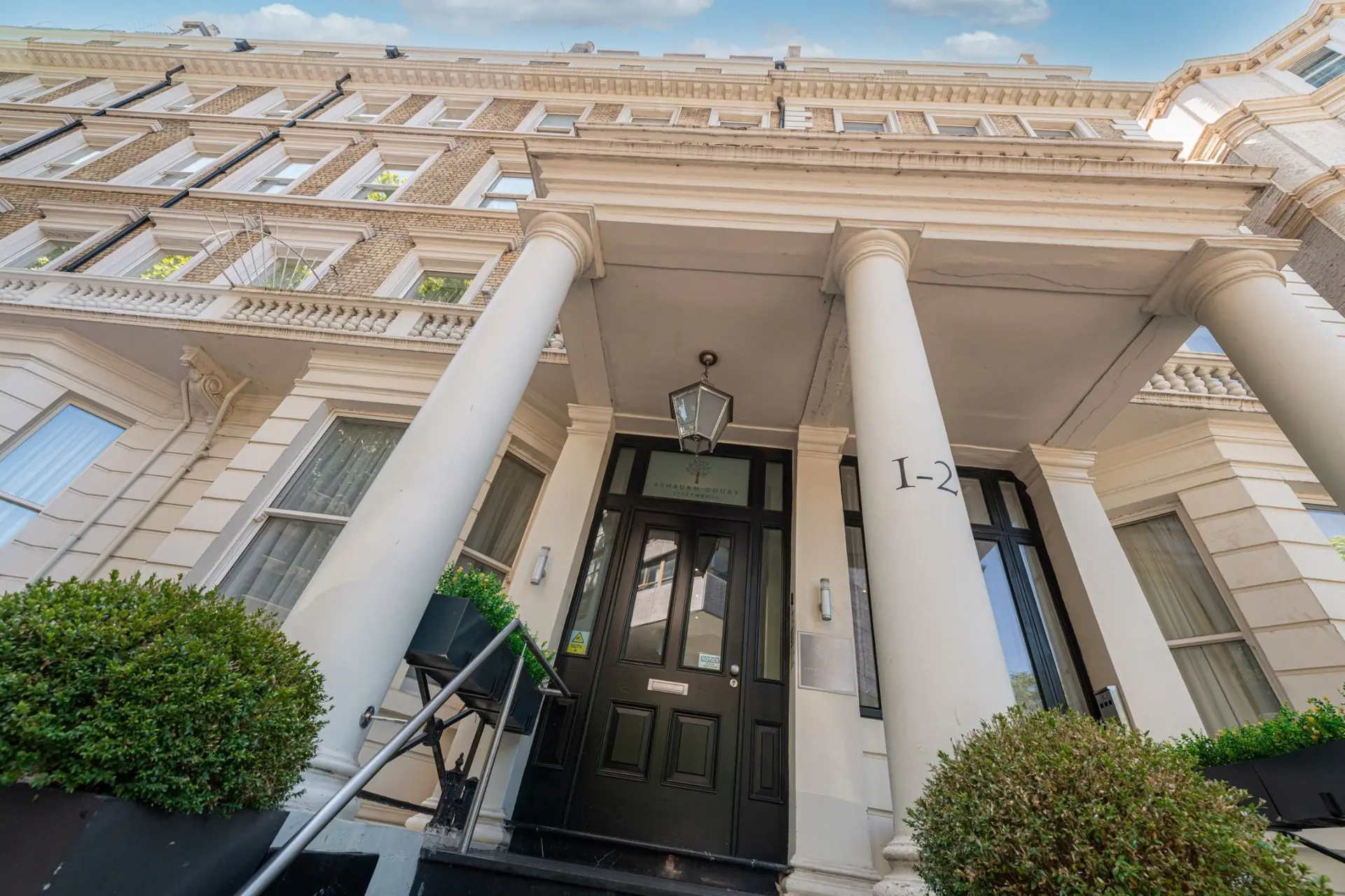 Entrance to Ashburn Court serviced apartments at 1–2 Ashburn Gardens, Kensington, London