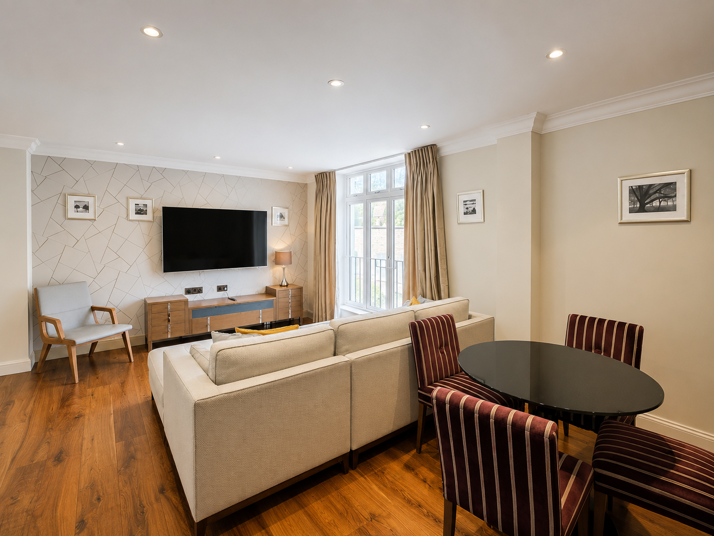 Living and dining area in the One Bedroom Executive apartment at Claverley Court