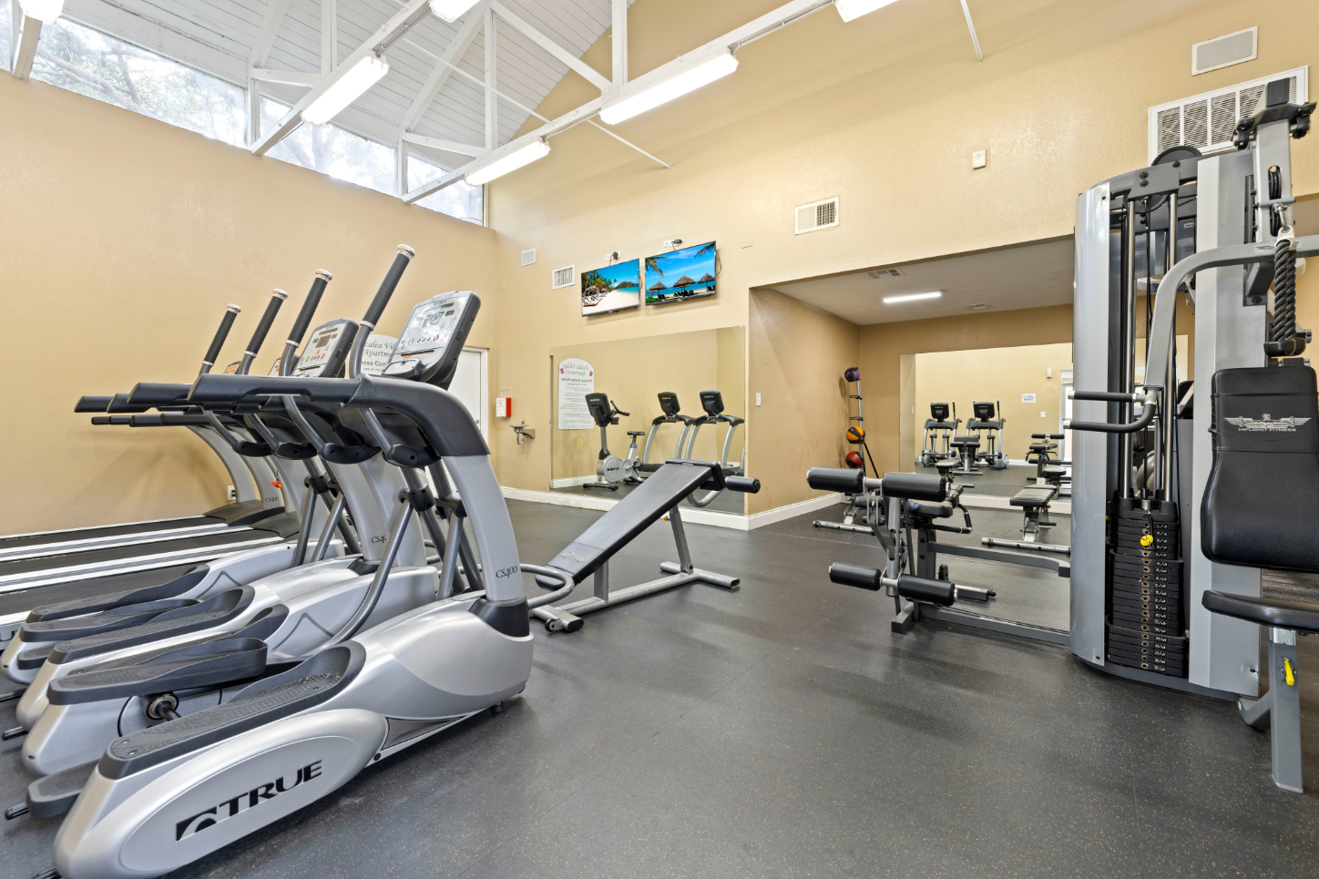 Gym with treadmills and stationary bikes