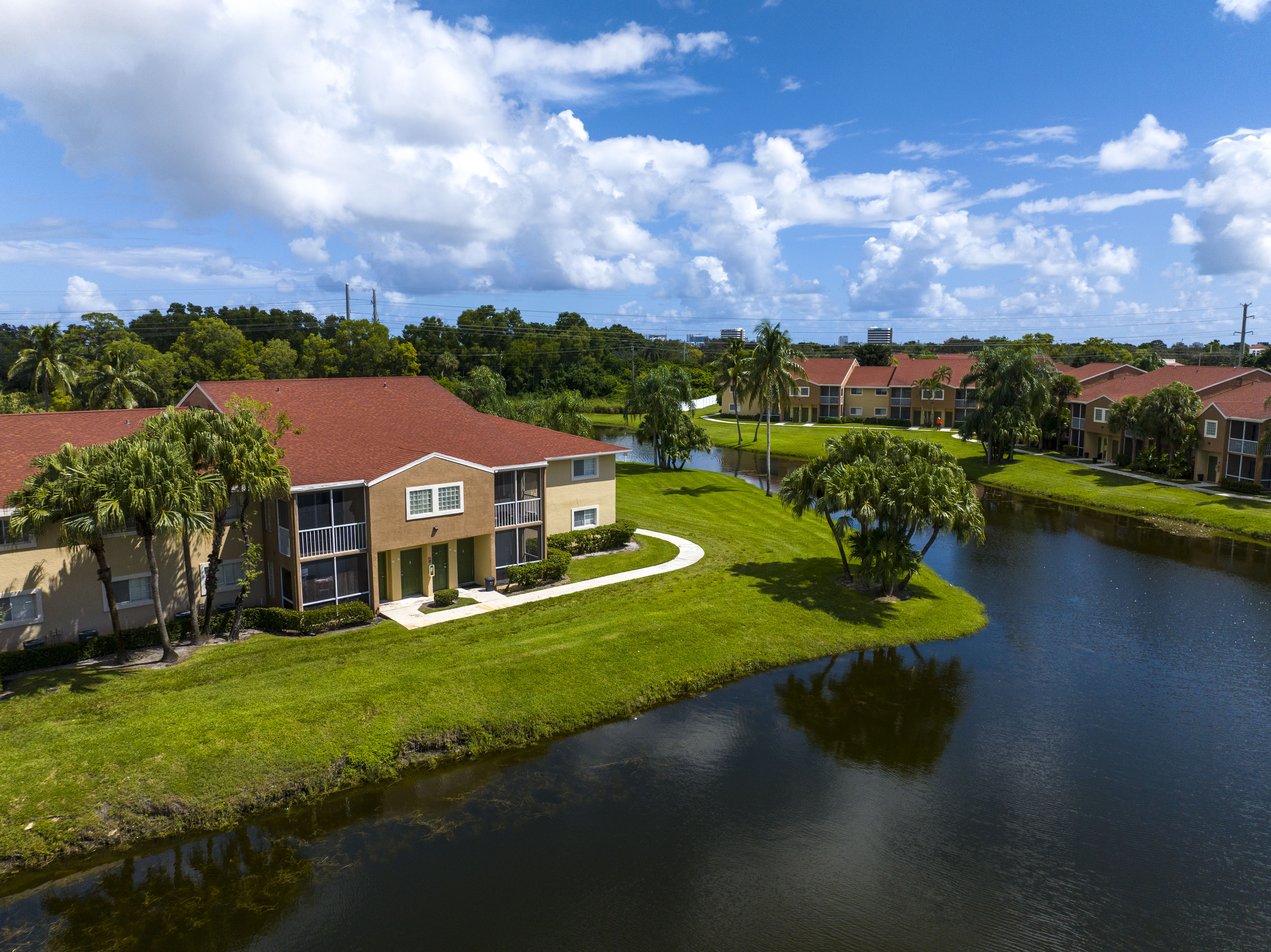 Drone shot of exterior with pond