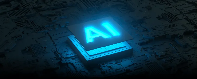 Glowing blue AI text on a microchip against a dark circuit board background.