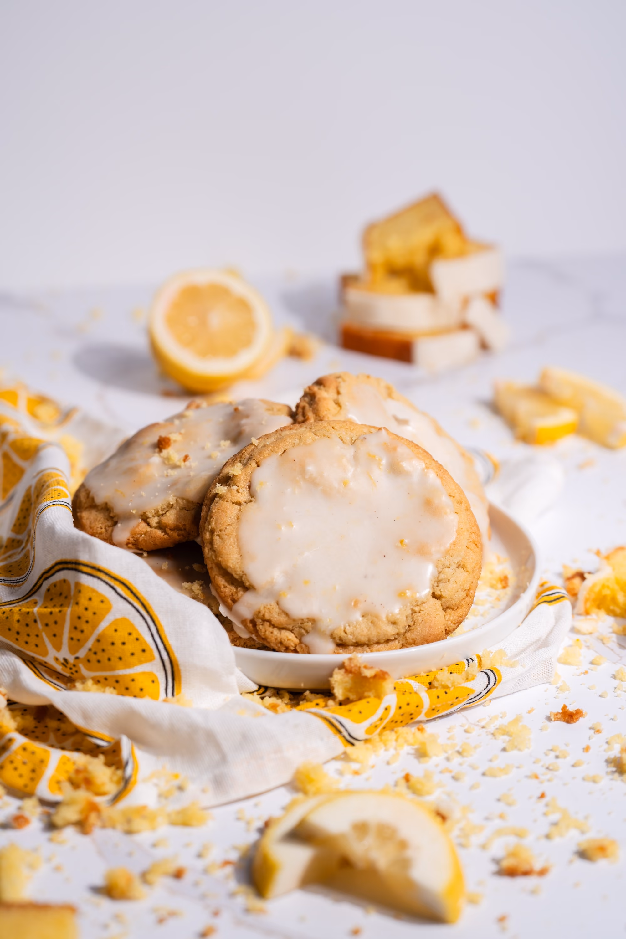 Glazed lemon poundcake cookies with lemon slices and poundcake cubes