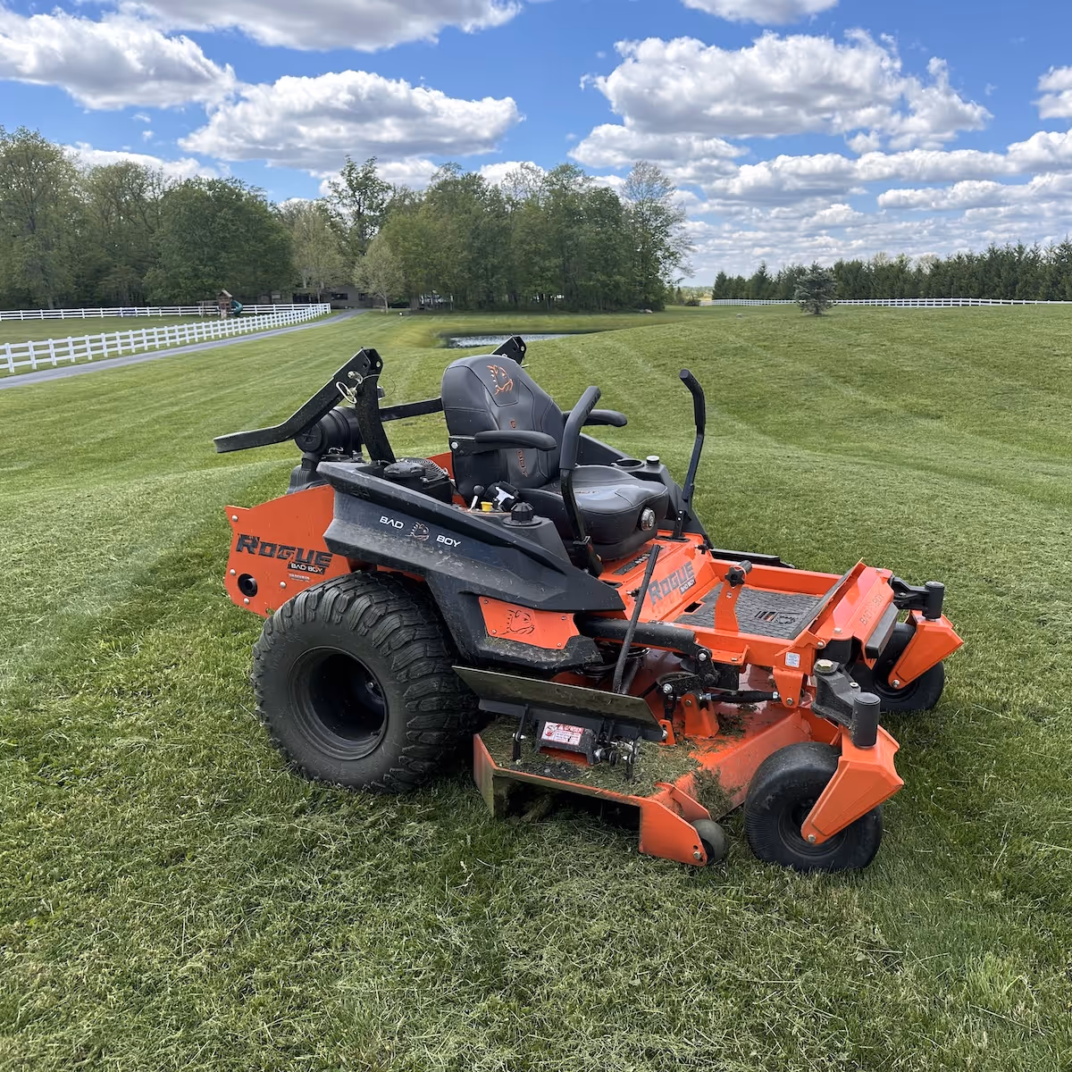 Routine lawn mowing and edging service near me by Iron Wolf Land Management