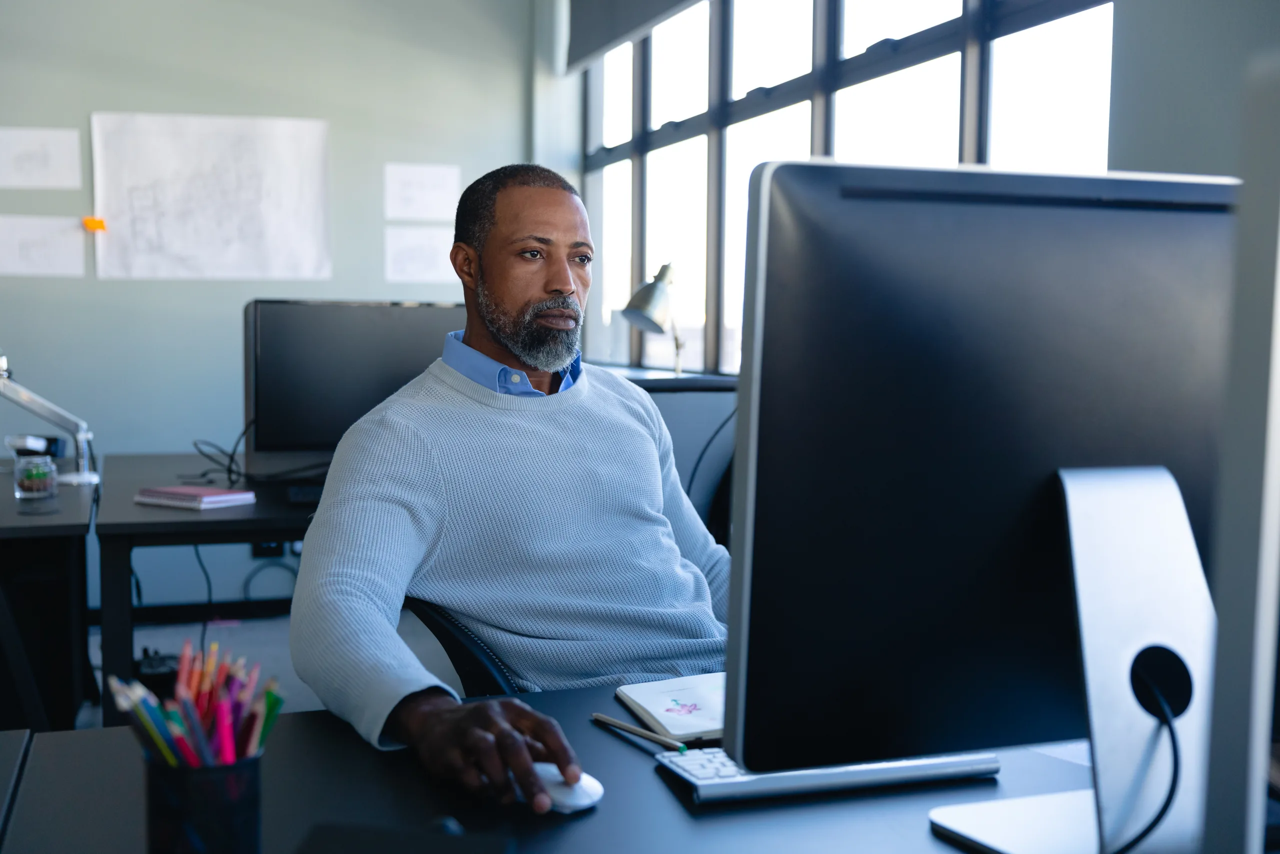 African American businessman working at his office desk