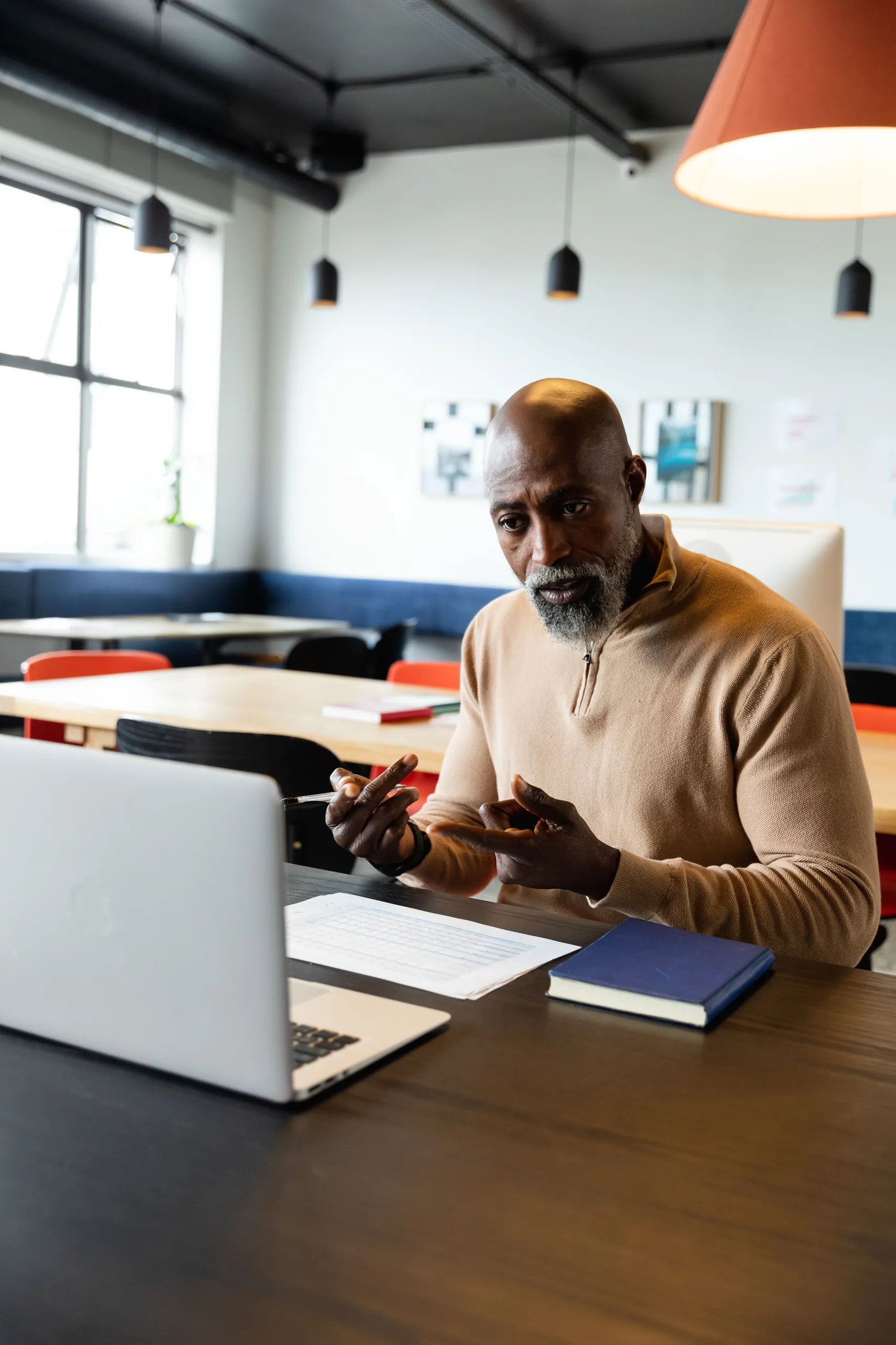 Professional working remotely on a laptop