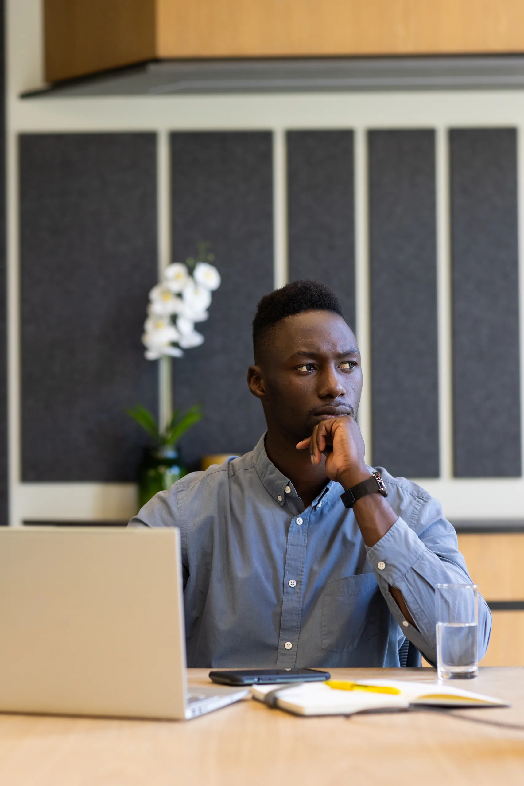 Thoughtful businessman working at his desk