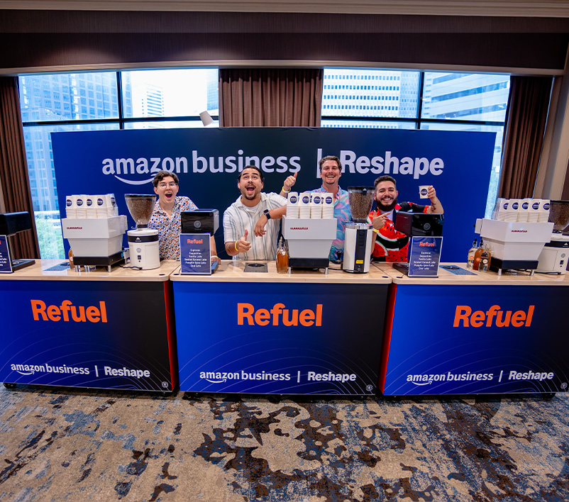 Nightowl baristas smile before serving at Amazon Business' Reshape conference in Dallas