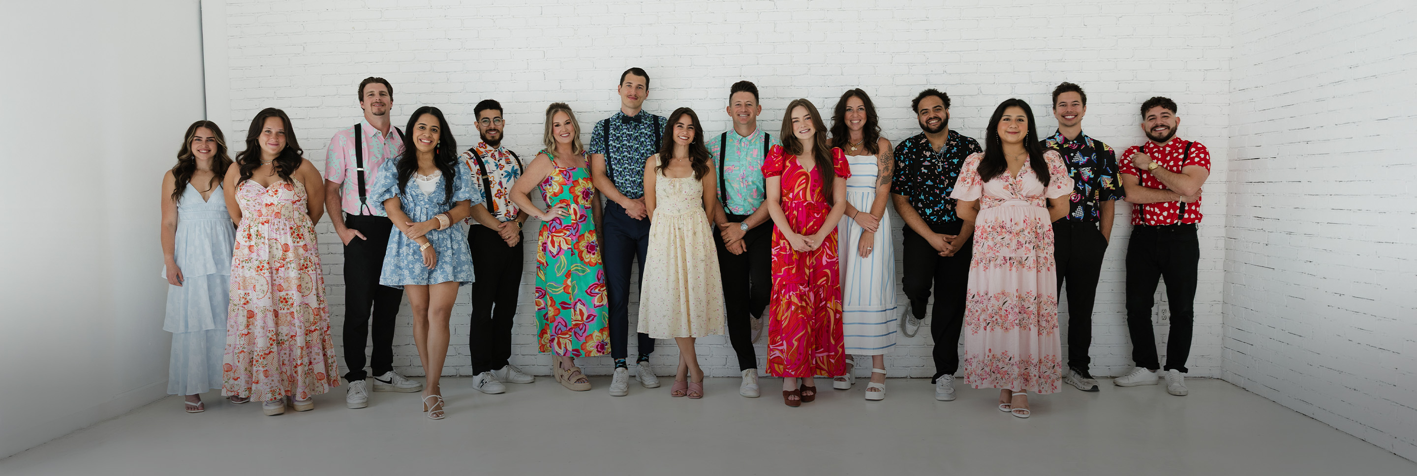 Nightowl Coffee team posed together in formal attire at an event.