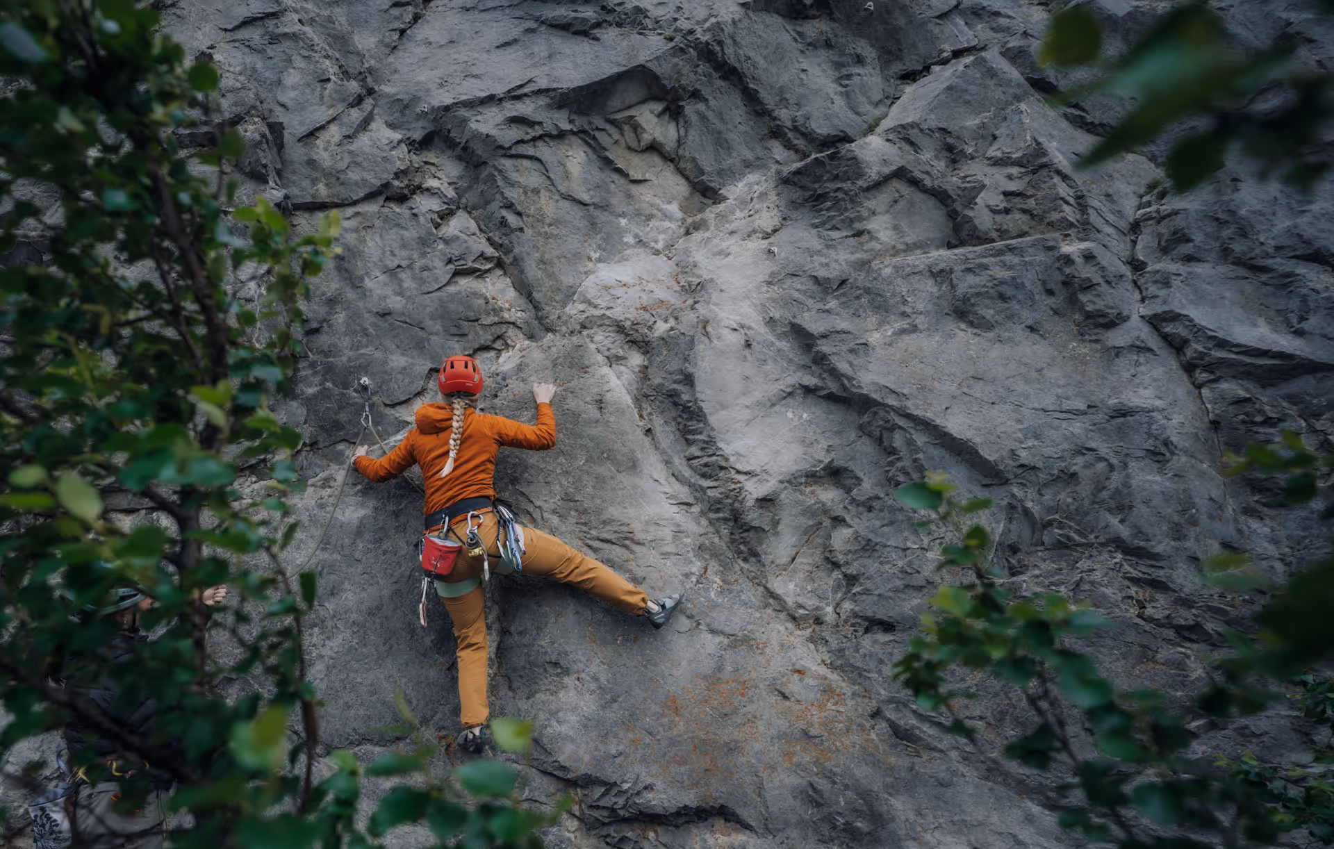 Woman climbing Emerald Lake Wall in Yoho National Park.