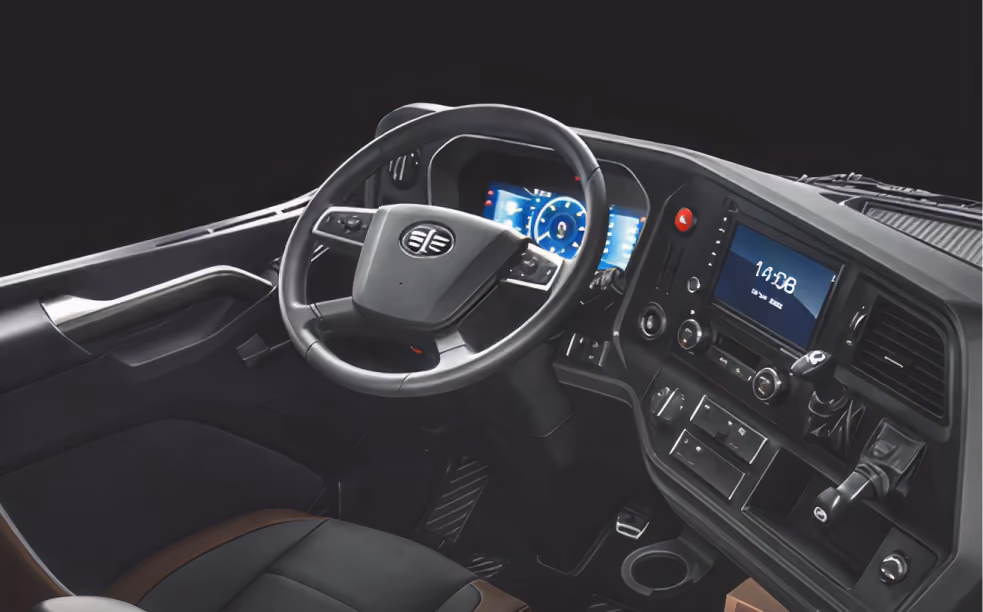 Modern vehicle cockpit with steering wheel, digital gauges, touchscreen display, and control switches