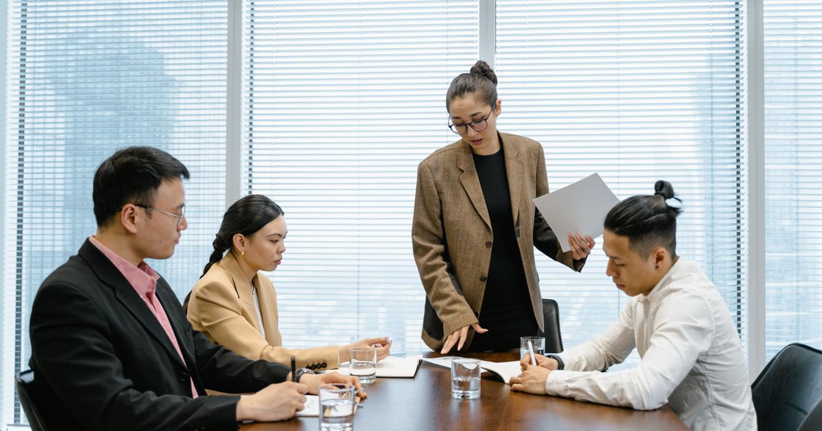 Consultants working together in a meeting