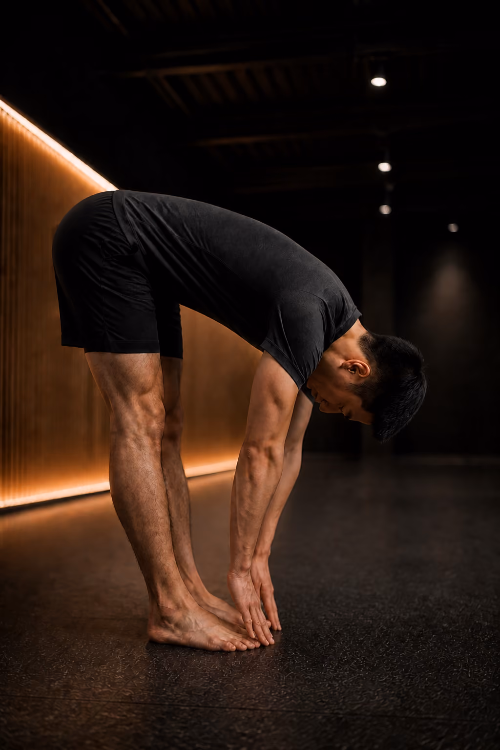 Person performing a toe touch stretch