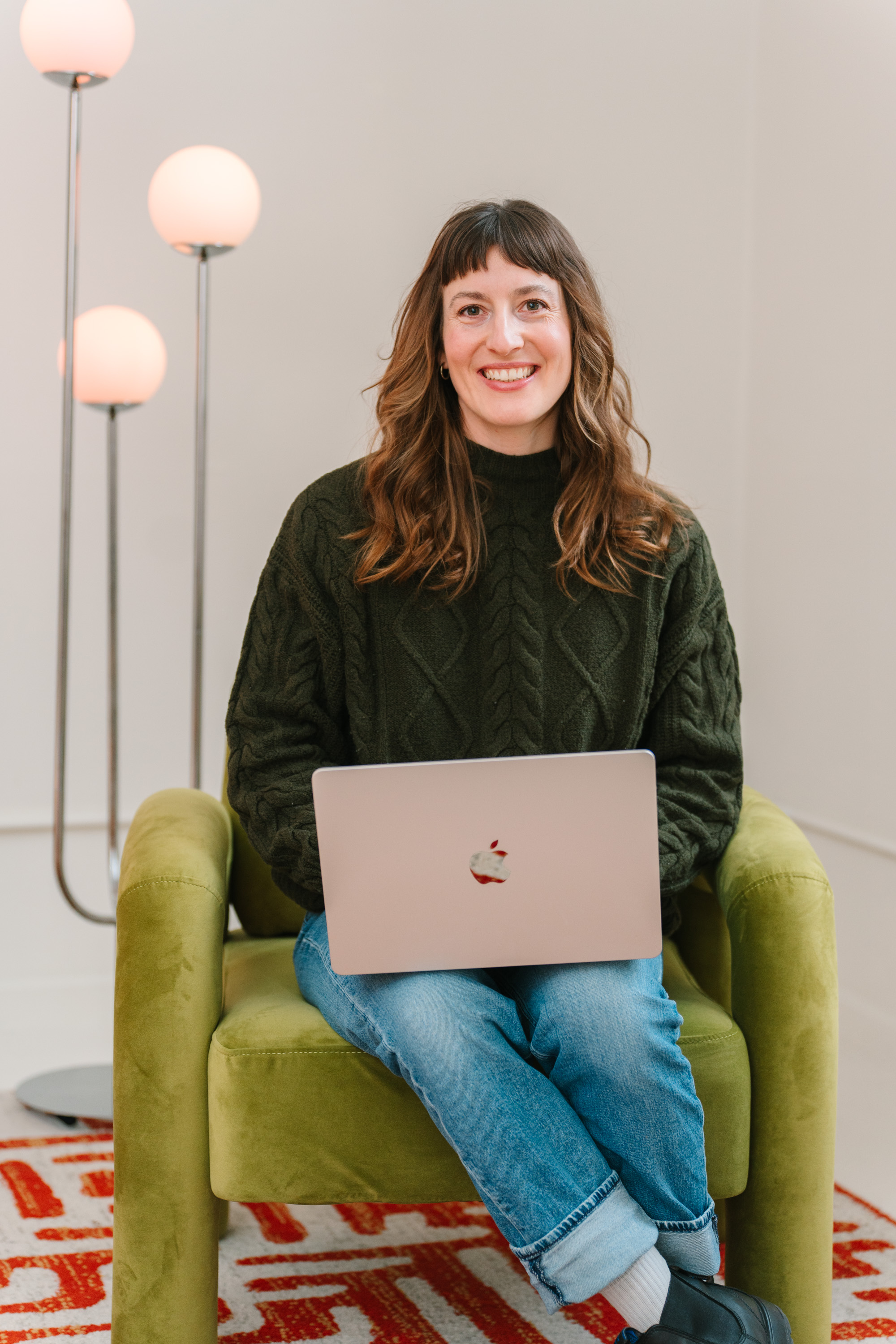 Deanne Vincent working on a laptop