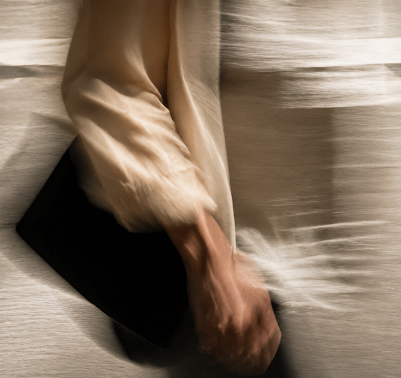 Soft, blurred close-up in warm beige light