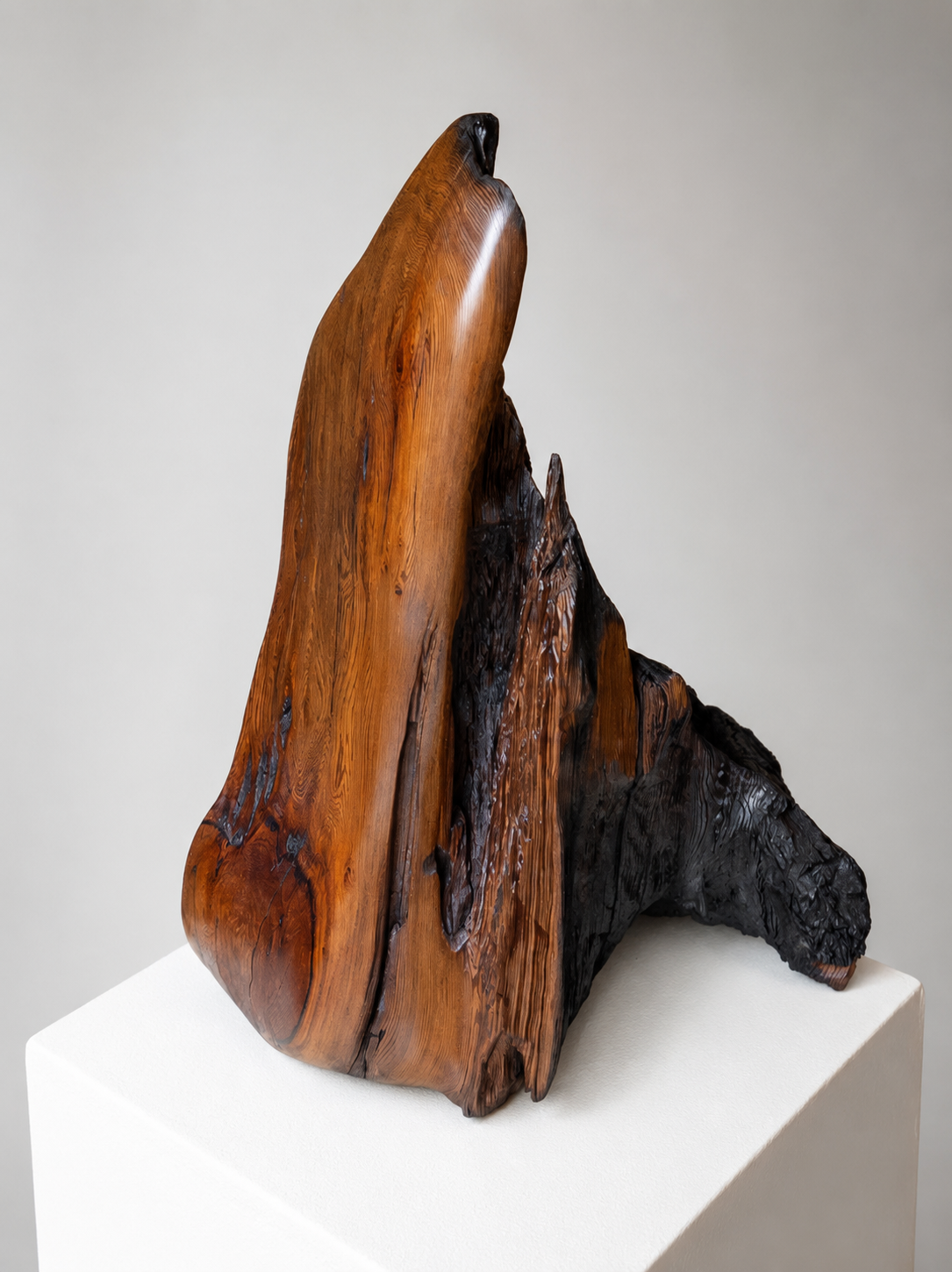 Carved wood sculpture shown in the upstairs gallery