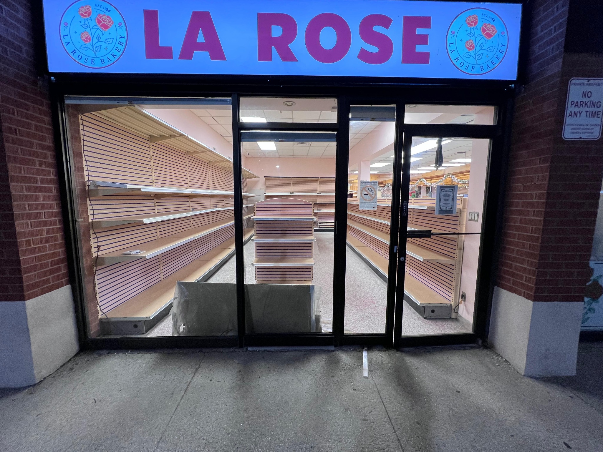 La Rose Bakery storefront in Etobicoke with shelving visible through the entrance