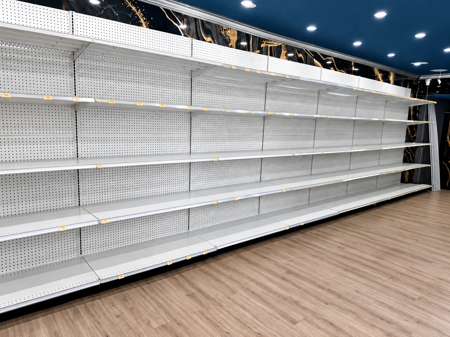 A continuous wall-shelving run.