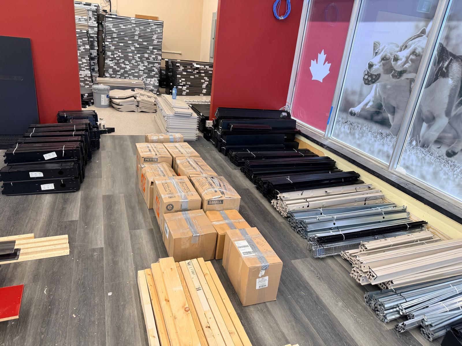 Dismantled fixture components grouped near the storefront.