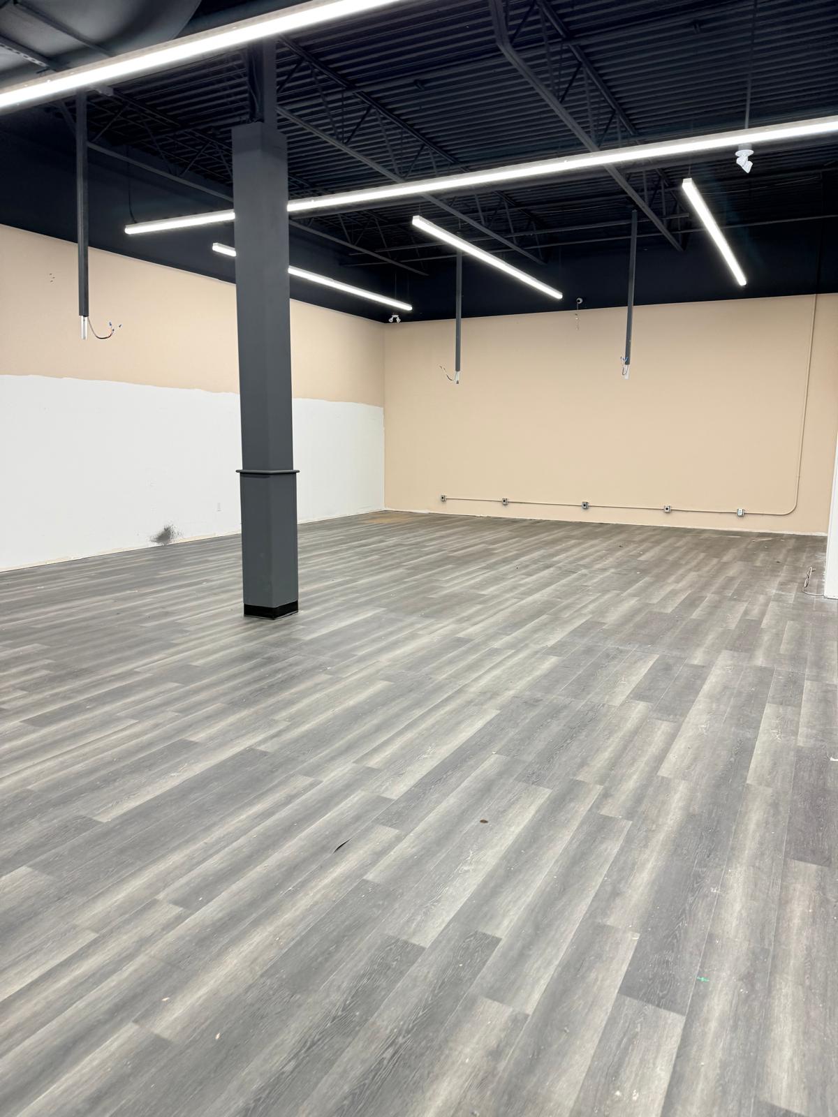 The cleared floor, viewed along the side wall.