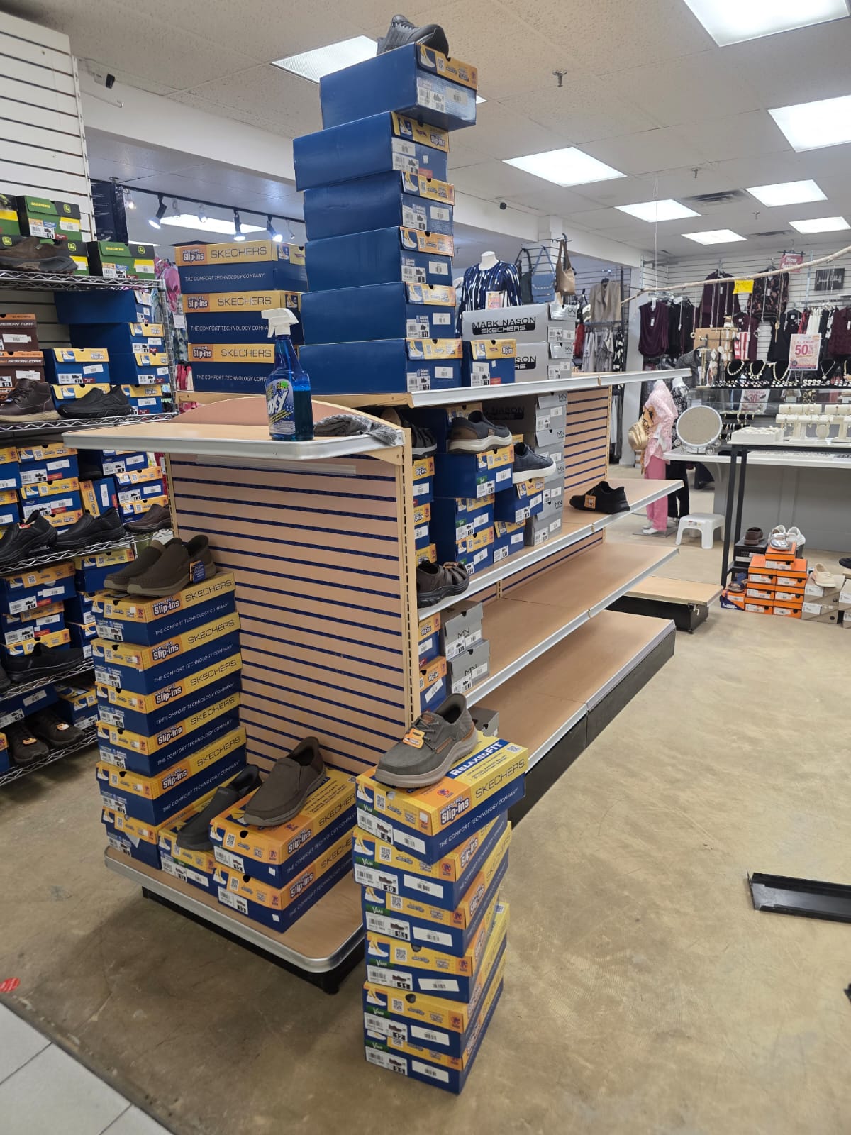 Gondola end shelving within the store layout.
